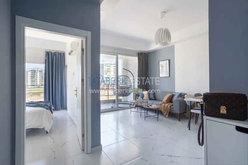 Purchase  Apartment 1+1 furnished with designer interior in a new building, Avsallar area - Alanya. Suitable for short term rental 1 