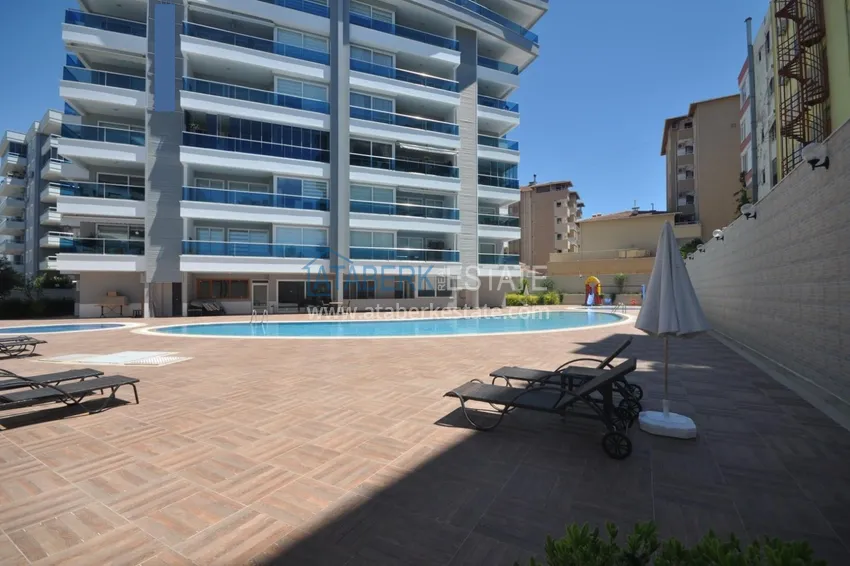 \ Apartment 2 + 1 furnished in a residential complex on the first coastline, Tosmur area - Alanya 1 
