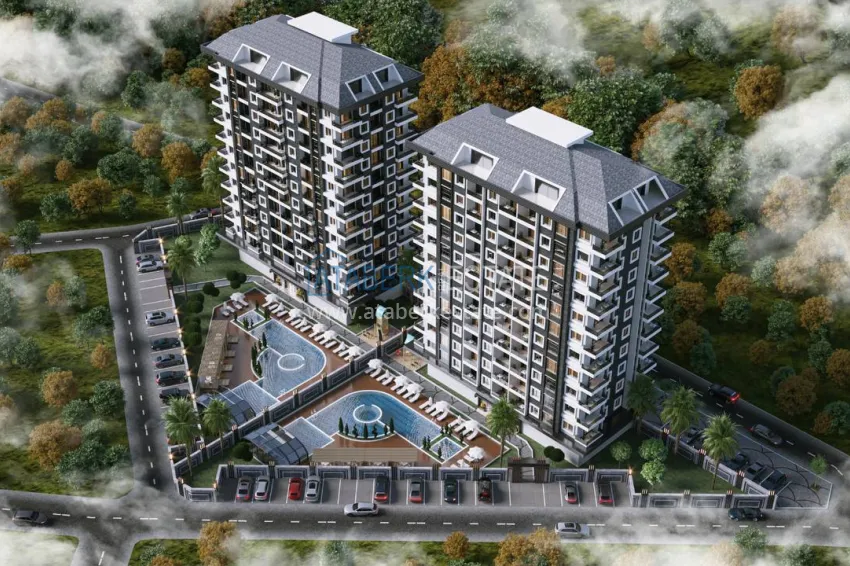 Finished two-bedroom apartment in a complex under completion in Mahmutlar 1