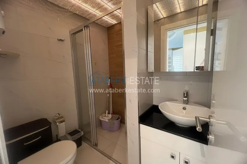 Purchase 1+1 apartment for short-term rent in the center of Alanya 7