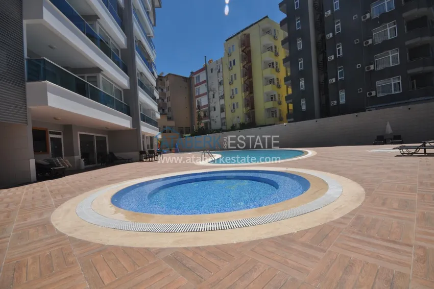 \ Apartment 2 + 1 furnished in a residential complex on the first coastline, Tosmur area - Alanya 8 