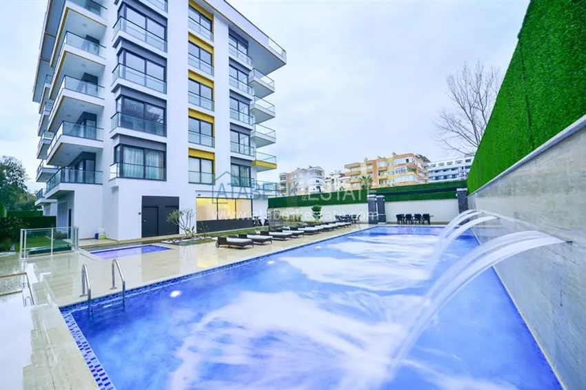 1+1 furnished apartment in a complex on the first coastline, Oba-Alanya area. Real estate for residence permit 1 