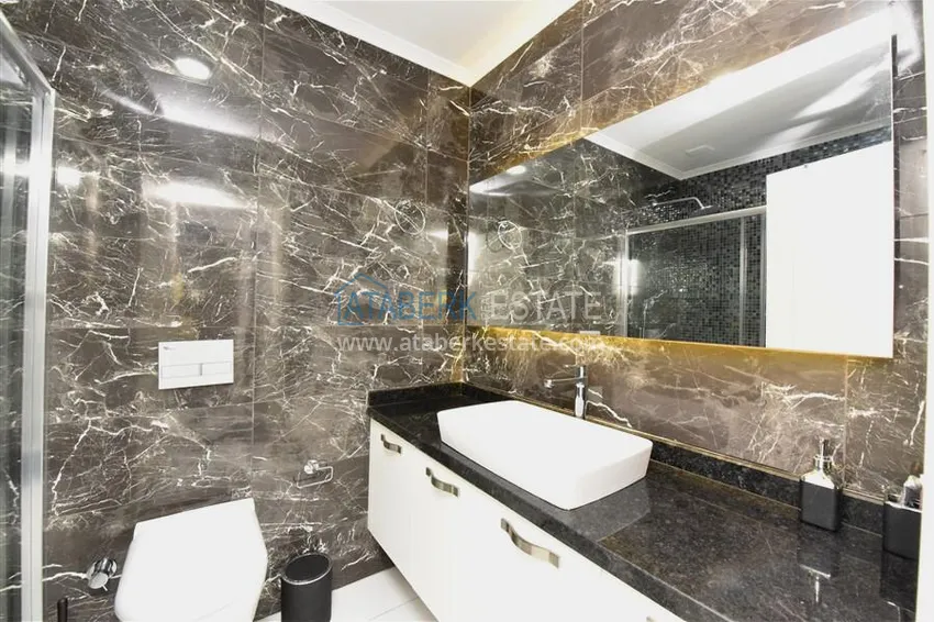 Purchase Compact 1+1 penthouse for rent in Kargicak with direct sea and mountain views C12 11 