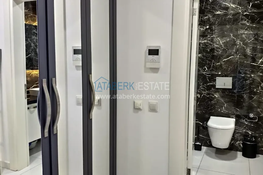 Purchase Compact 1+1 penthouse for rent in Kargicak with direct sea and mountain views C12 12 