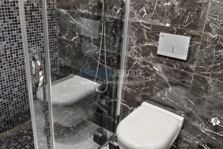 Purchase Compact 1+1 penthouse for rent in Kargicak with direct sea and mountain views C12 13 