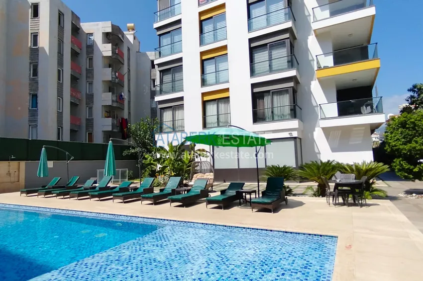 1+1 furnished apartment in a complex on the first coastline, Oba-Alanya area. Real estate for residence permit 2 