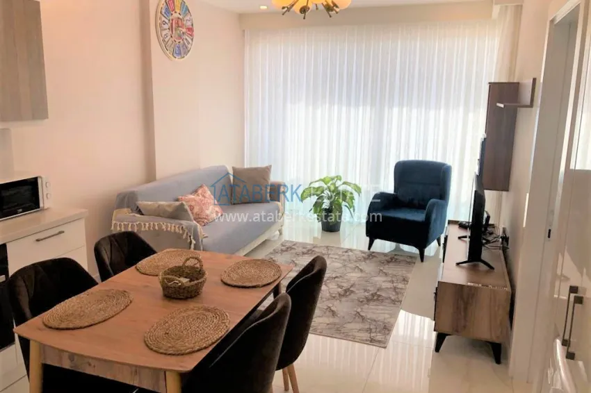 Purchase Furnished 1+1 apartment in a new residential complex near Cleopatra Beach - Alanya Center 1