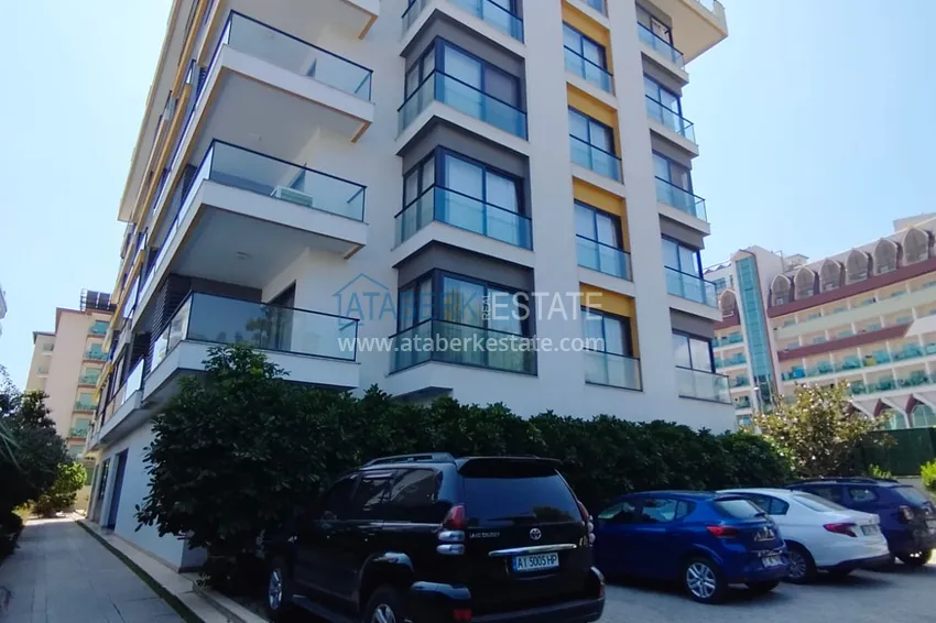 1+1 furnished apartment in a complex on the first coastline, Oba-Alanya area. Real estate for residence permit 5 