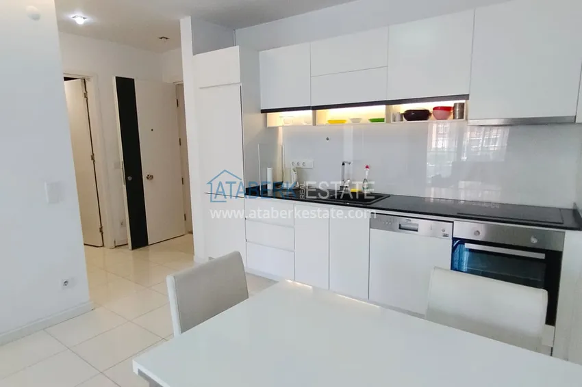 Purchase  1+1 furnished apartment in a complex on the first coastline, Oba-Alanya area. Real estate for residence permit 3 