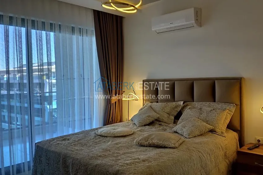 Purchase Compact 1+1 penthouse for rent in Kargicak with direct sea and mountain views C12 9 