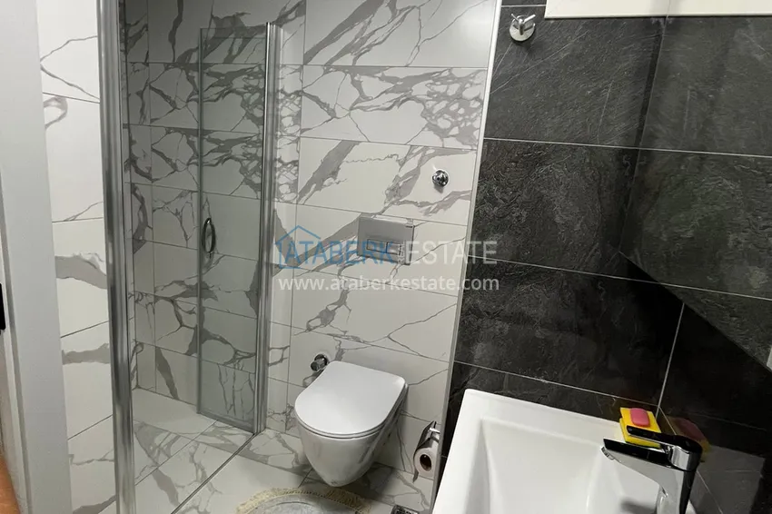 Purchase 1+1 apartment for rent in a comfortable new complex - Alanya, Oba district No. 1 9 