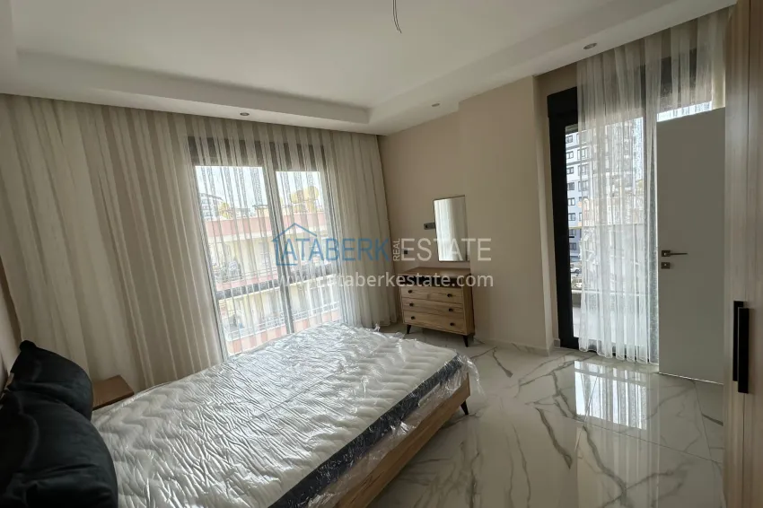 Purchase Apartments in a modern city house in the very center of Alanya at the final stage of construction 17 