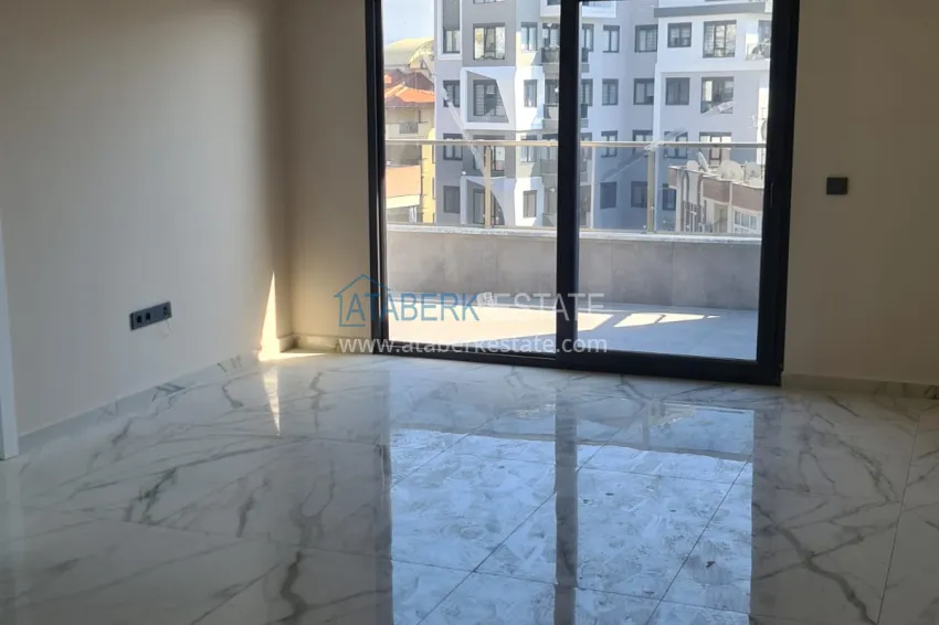 Purchase Apartments in a modern city house in the very center of Alanya at the final stage of construction 24 