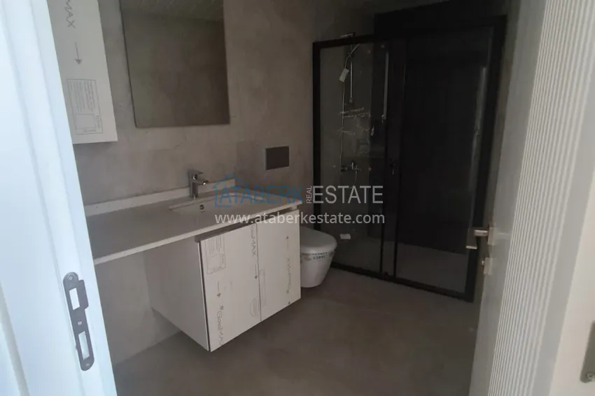 Purchase Apartments in a modern city house in the very center of Alanya at the final stage of construction 31 