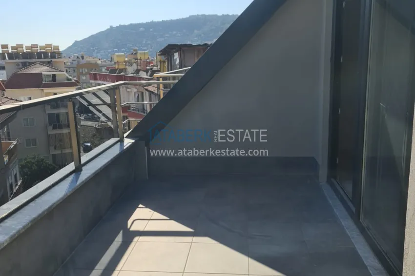 Purchase Apartments in a modern city house in the very center of Alanya at the final stage of construction 36 