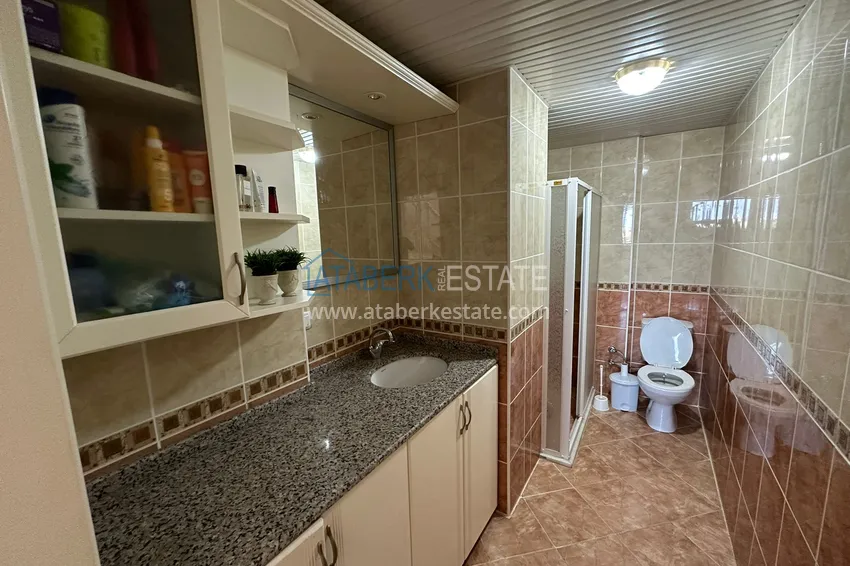 Purchase 4+1 penthouse duplex with furniture and sea views in an area open to residence permits, Tosmur — Alanya 15
