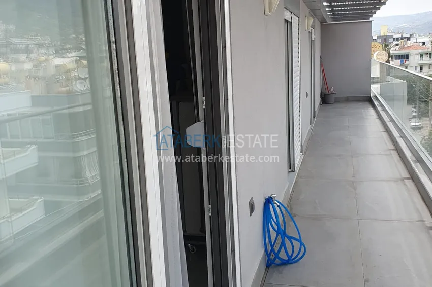 Purchase Linear four-room penthouse with furniture in the center of Alanya in a comfortable complex 26 