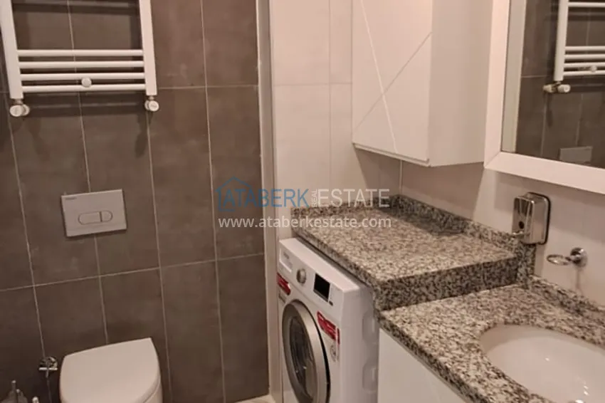 Purchase  3+1 furnished apartment with a glazed balcony and mountain views - Alanya Center 14 