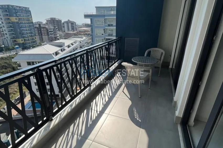 Purchase  1+1 apartment with furniture and sea view in a hotel-type complex, Mahmutlar district — Alanya 12 