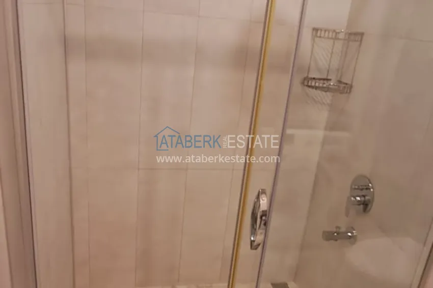 Purchase  3+1 furnished apartment with a glazed balcony and mountain views - Alanya Center 15 
