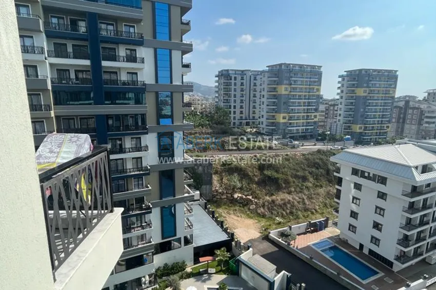 Purchase  1+1 apartment with furniture and sea view in a hotel-type complex, Mahmutlar district — Alanya 13 