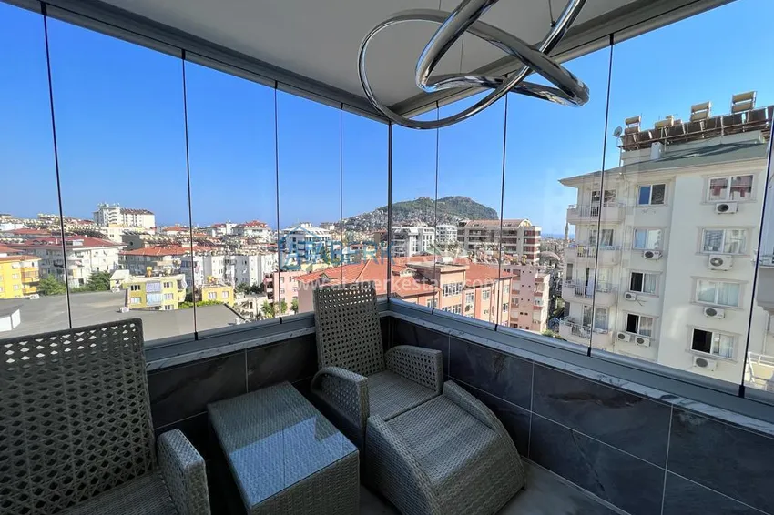 Purchase  Apartment 2+1 with furniture and glazed balcony in the center of Alanya - Cleopatra Beach area. Real estate for residence permit 15 