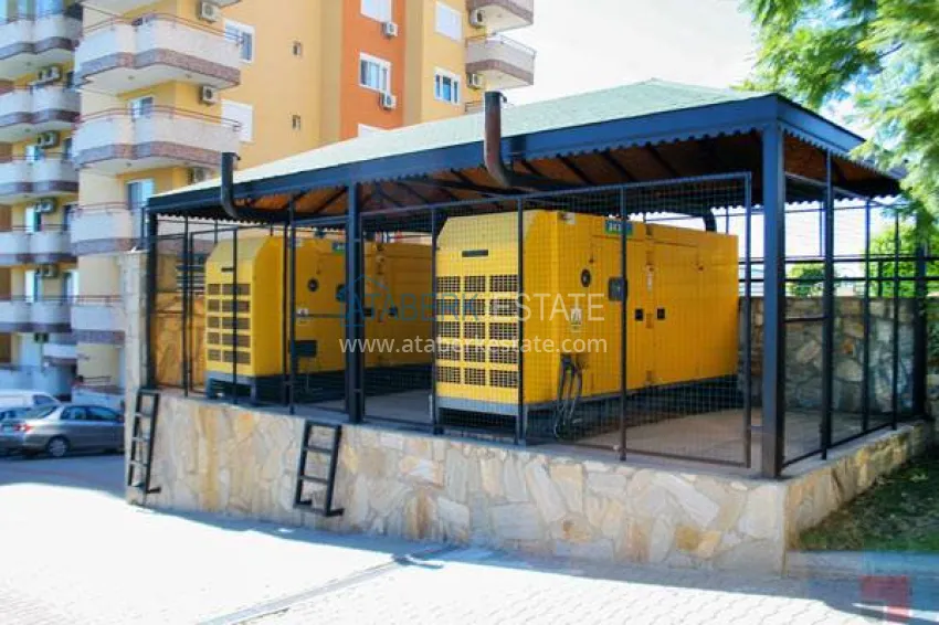 Panoramic two-bedroom apartment with furniture, glazed balcony in Mahmutlar 20