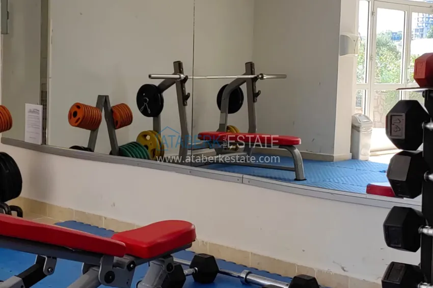 Panoramic two-bedroom apartment with furniture, glazed balcony in Mahmutlar 23