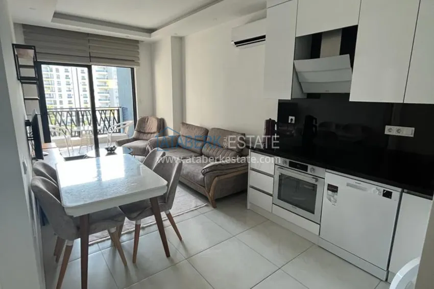 Purchase  1+1 apartment with furniture and sea view in a hotel-type complex, Mahmutlar district — Alanya 2 