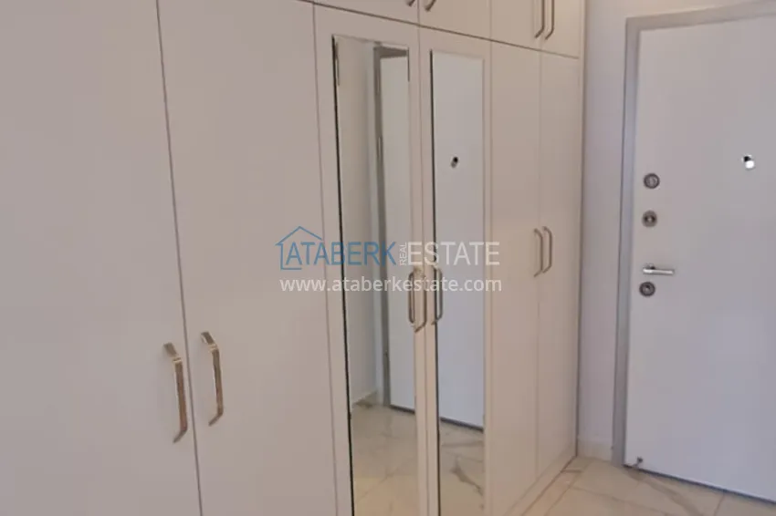 Purchase  3+1 furnished apartment with a glazed balcony and mountain views - Alanya Center 2 