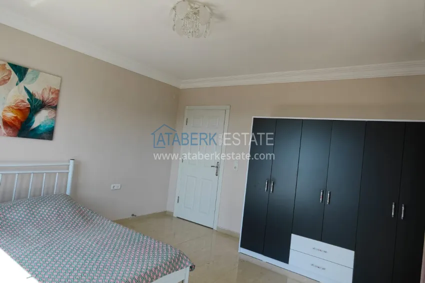 Purchase Panoramic two-bedroom apartment with furniture, glazed balcony in Mahmutlar 21