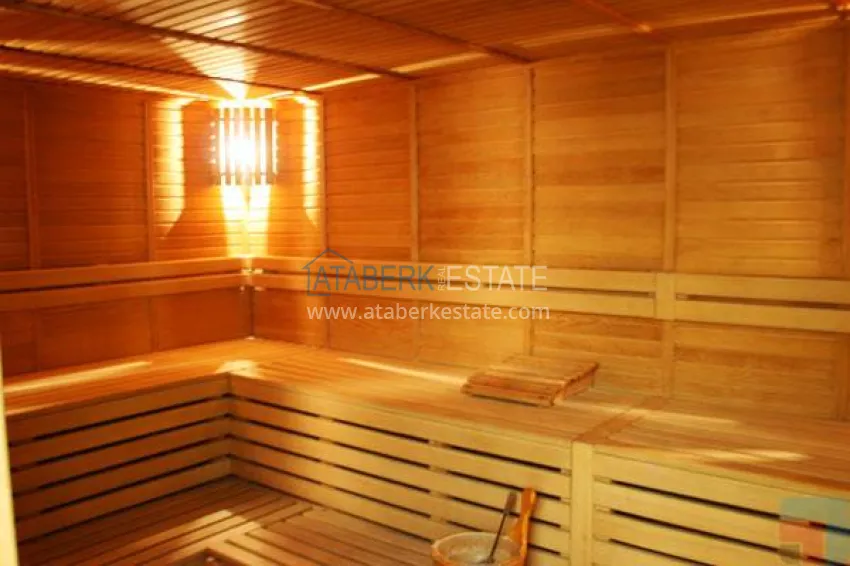 Panoramic two-bedroom apartment with furniture, glazed balcony in Mahmutlar 25