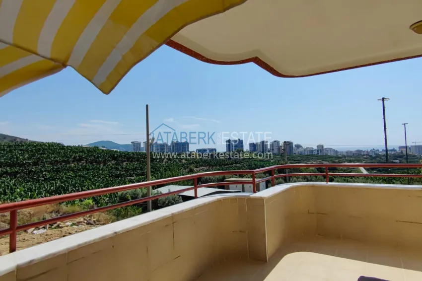 Purchase Panoramic two-bedroom apartment with furniture, glazed balcony in Mahmutlar 23