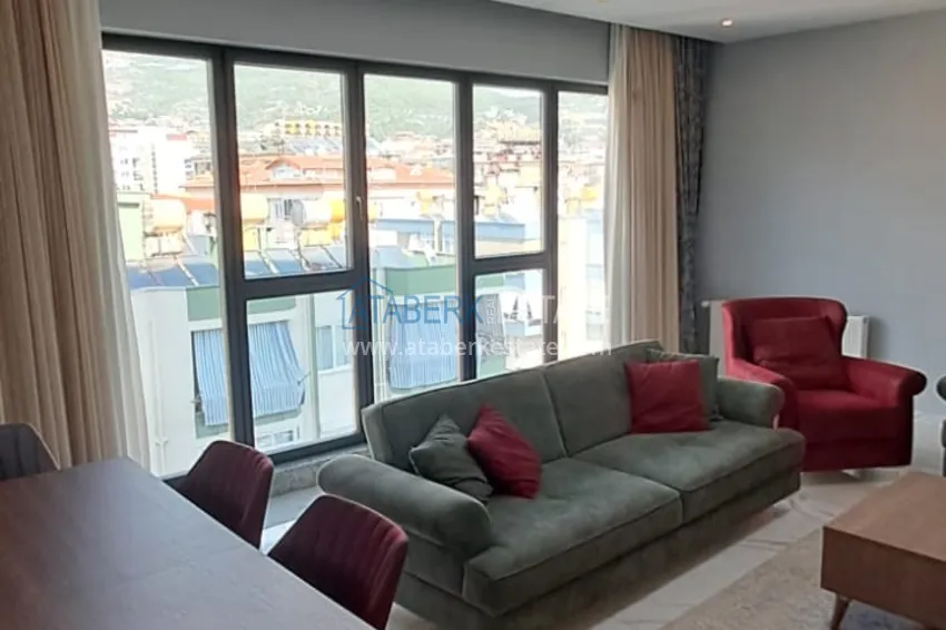 Purchase  3+1 furnished apartment with a glazed balcony and mountain views - Alanya Center 4 