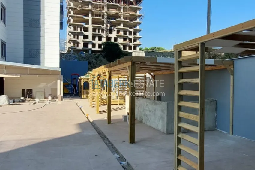 Finished 1+1 apartment in a multi-apartment residential complex in Mahmutlar — center 3 