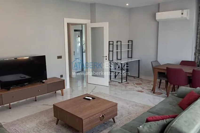 Purchase  3+1 furnished apartment with a glazed balcony and mountain views - Alanya Center 5 