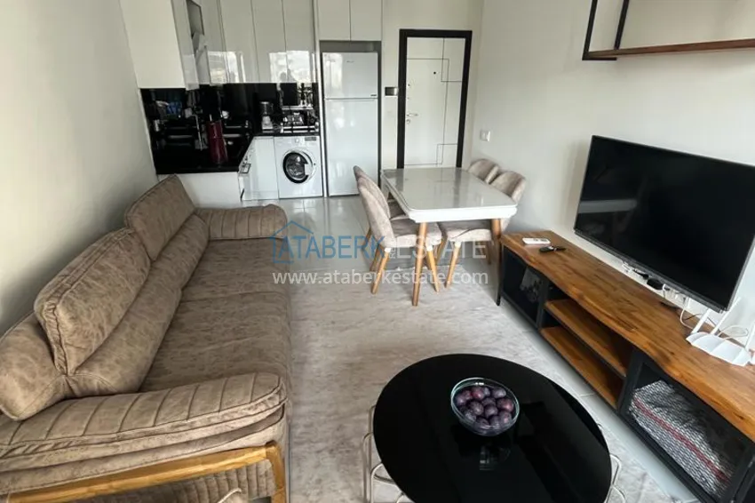 Purchase  1+1 apartment with furniture and sea view in a hotel-type complex, Mahmutlar district — Alanya 4 