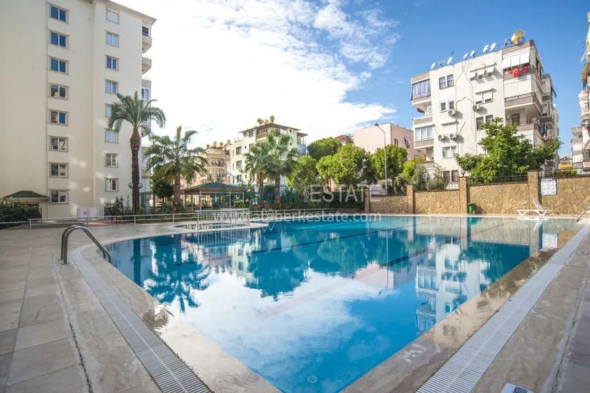 Apartment 2+1 with furniture and glazed balcony in the center of Alanya - Cleopatra Beach area. Real estate for residence permit 4 