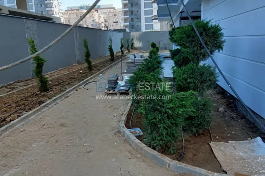 Finished 1+1 apartment in a multi-apartment residential complex in Mahmutlar — center 6 