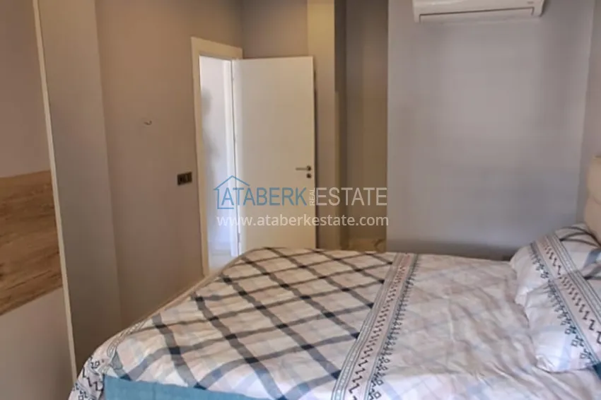 Purchase  3+1 furnished apartment with a glazed balcony and mountain views - Alanya Center 10 