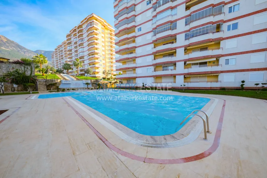 Panoramic two-bedroom apartment with furniture, glazed balcony in Mahmutlar 8