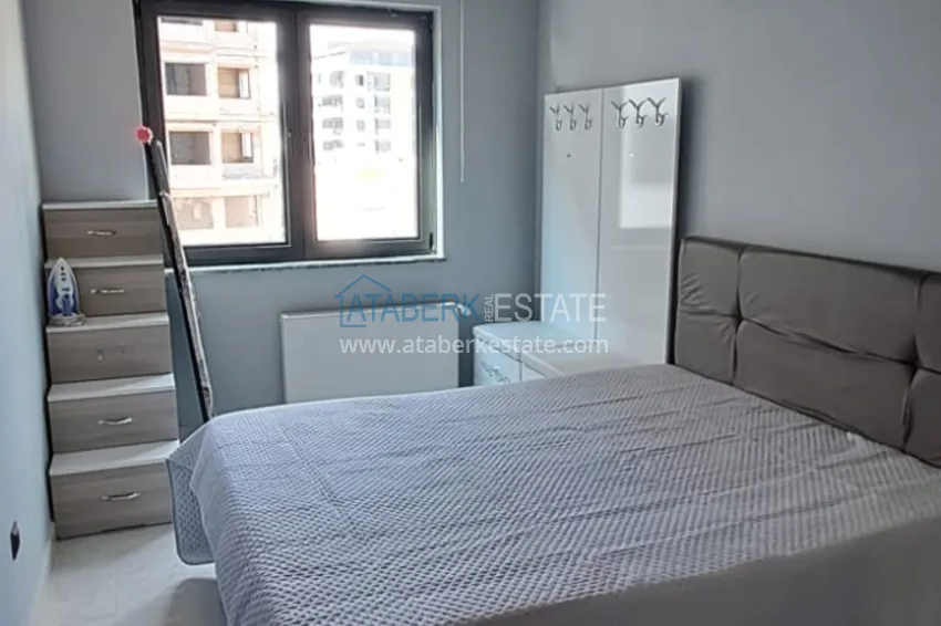 Purchase  3+1 furnished apartment with a glazed balcony and mountain views - Alanya Center 11 