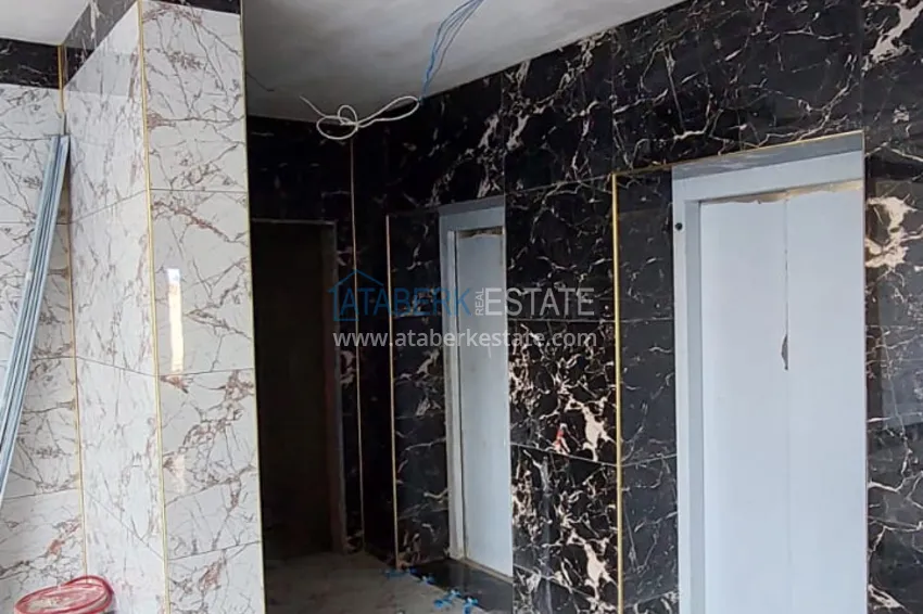 Finished 1+1 apartment in a multi-apartment residential complex in Mahmutlar — center 9 