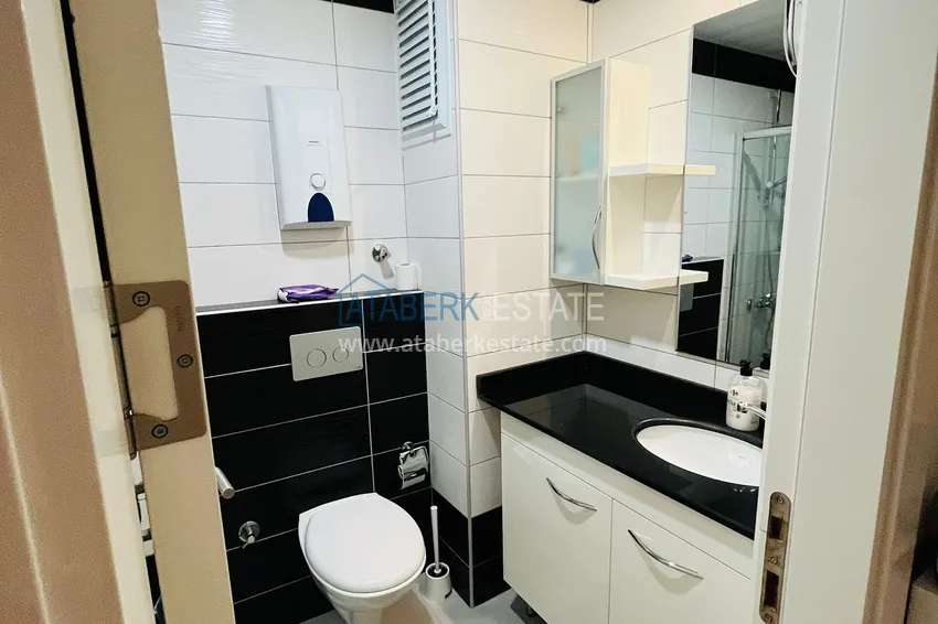 Purchase  Apartment in Avsallar in a complex with a private beach, furnished with sea views  11 