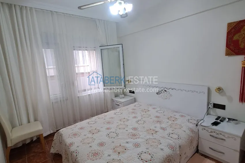 Purchase  Квартира 2+1 в центре Алании с мебелью, отдельной кухней и застекленным балконом  12 