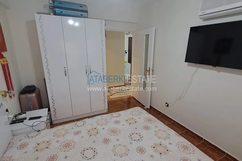 Purchase  Квартира 2+1 в центре Алании с мебелью, отдельной кухней и застекленным балконом  13 