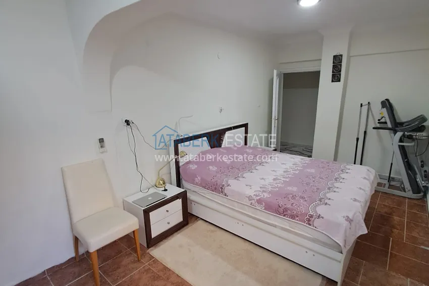 Purchase  Квартира 2+1 в центре Алании с мебелью, отдельной кухней и застекленным балконом  14 