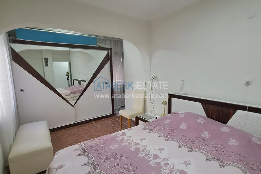 Purchase  Квартира 2+1 в центре Алании с мебелью, отдельной кухней и застекленным балконом  15 