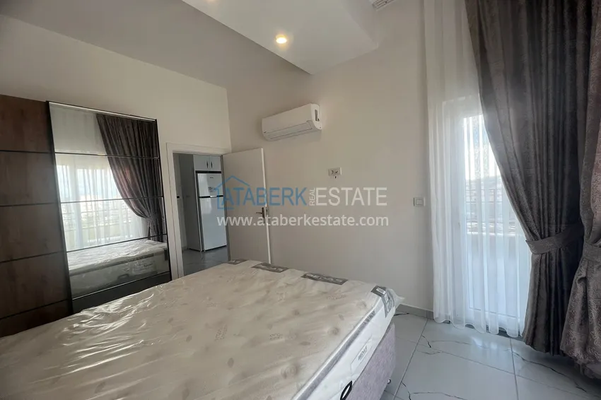 Purchase  Comfort class one-bedroom apartment for rent, on the 9th floor with sea and city views in Avsallar No. 96 5 