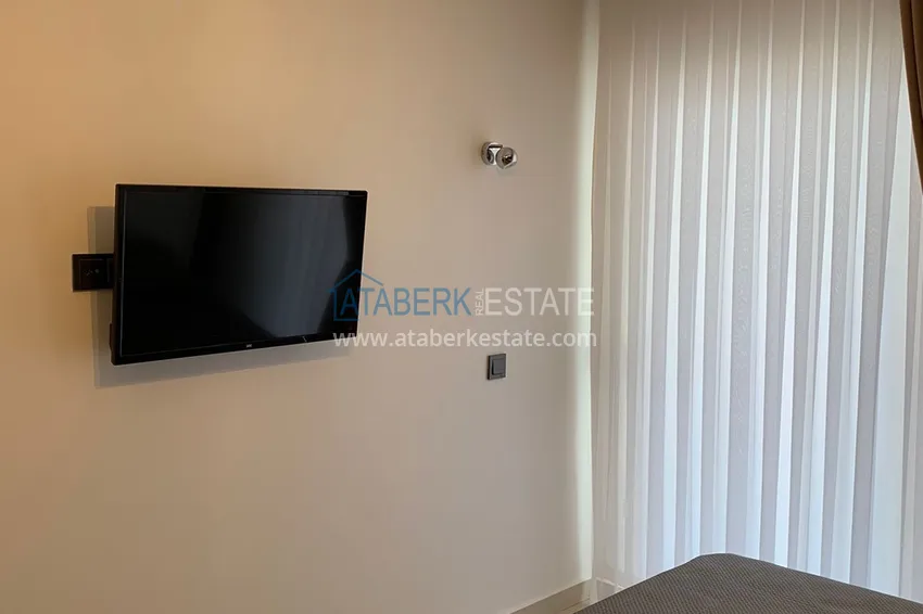 Purchase 1 + 1 apartment furnished in a premium complex, Tosmur area - Alanya 6 
